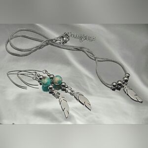 Elegant Silver and Turquoise Feather Necklace